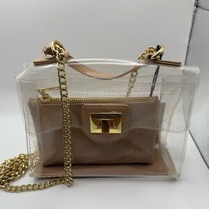 Transparent Steve Madden Shoulder Bag that includes a tan clutch
